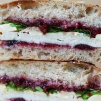 Turkey & Brie Sandwich · Turkey, brie, cranberry sauce and arugula pair perfectly for a creamy and tangy sandwich tha...