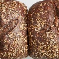 Russian Pumpernickel · Dark and slightly sweet rye bread, with rye grain mixed in.