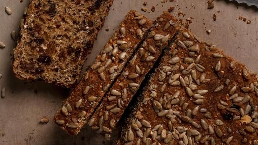 Morning Spelt · A hearty bread with a blend of spelt and whole wheat flours, loaded with raisins, quinoa, and sunflower seeds. Perfect for breakfast or served with cheese and meat boards.