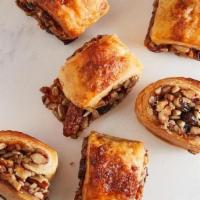 Apricot Rugelach · Traditional Jewish rolled cookies made with a sweetened cream cheese dough and filled with a...