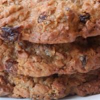Oatmeal Raisin Cookie · Chewy and moist Organic Oatmeal raisin cookies, studded with pecans.
