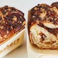 Dark Chocolate & Nutella Braided Babka · Our sweet & buttery braided babka loaf is filled with Nutella and dark chocolate chips, topp...