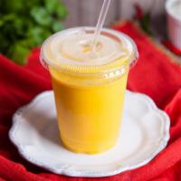 Mighty Mango Smoothie · Refreshing smoothie with mango, strawberries, and banana.