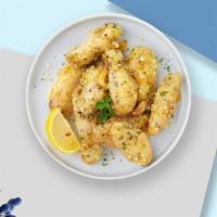 Great Garlic Parmesan Tenders · Fresh chicken wings fried until golden brown, and tossed in garlic and parmesan. Served with...