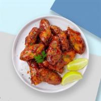 Simply Smokin' Bbq Wings · Fresh chicken wings fried until golden brown, and tossed in honey and barbecue sauce. Served...