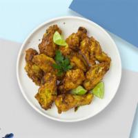 Lemon Hunter Pepper Wings · Fresh chicken wings fried until golden brown, and tossed in lemon pepper sauce. Served with ...