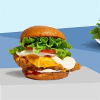 Courageous Cheese Fried Chicken Sandwich · Crispy fried chicken, cheddar cheese, mozzarella cheese, lettuce, tomato, onion, house mayo,...