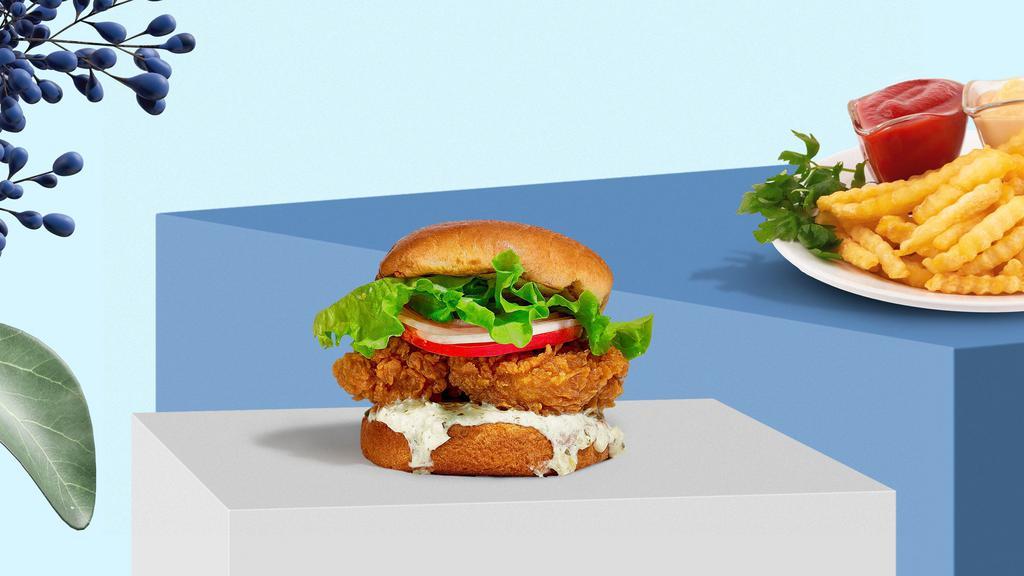 Clueless Classic Fried Chicken Sandwich · Crispy fried chicken, lettuce, tomato, onion, and house mayo sauce. Served on a golden hero roll.