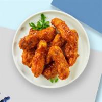 Bbq Bliss Tenders · Chicken tenders breaded and fried until golden brown before being tossed in barbecue sauce.