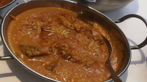 Lamb Korma · Boneless lamb cooked with almond and creamy sauce. Served with rice.