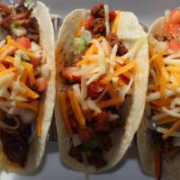 Eddie'S Tacos · 3 Soft Tacos Served with your choice of protein, lettuce, pico de gallo, mixed cheese and ch...