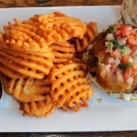 Cheeseburger · Topped with lettuce, tomato, and onion.