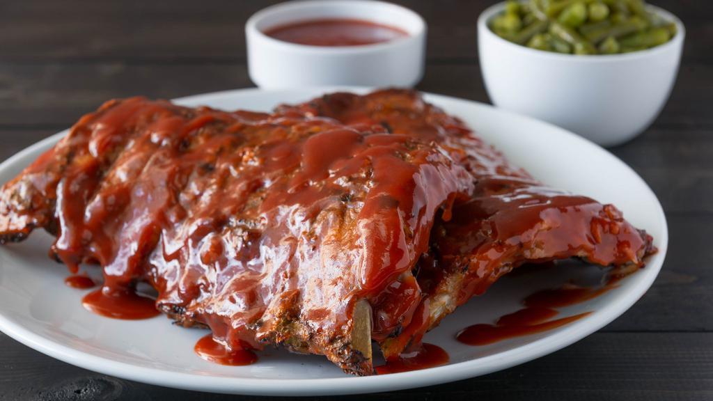 Pork Bbq Ribs · Our famous BBQ ribs, grilled to perfection and slathered in our special BBQ sauce!