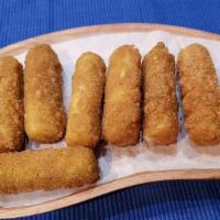Mozzarella Cheese Sticks (8) · Mozzarella cheese sticks served with marinara dipping sauce. Comes with 8 Pieces.