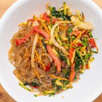 Japchae · Clear potato noodles stir fried with bulgogi beef & assorted vegetables over rice.