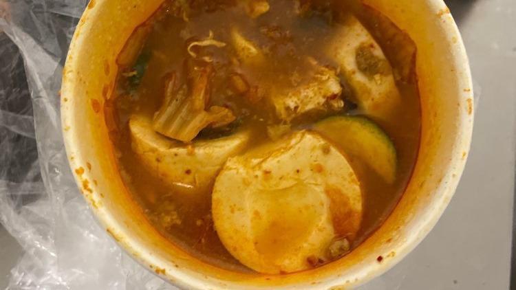 Seafood Soondubu Jjigae · Hot stew with soft tofu, pork, seafood scallions + rice.