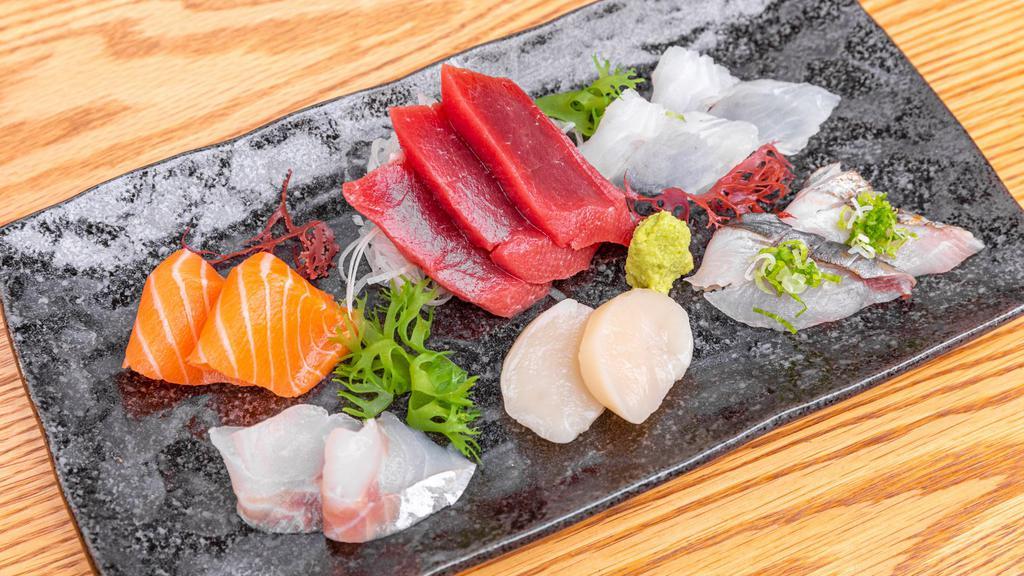 Sashimi Deluxe · 13 pieces sashimi of six varieties of fish. Sashimi is selected based on market availability.