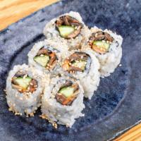 Salmon Skin · Cut roll with six pieces. With cucumber and sesame seeds. Without cucumber will be $15