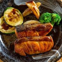Salmon Teriyaki · With zucchini, broccoli and potato. ( side vegetable may be changed without notice)