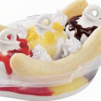 Banana Split · 3 scoops of Ice-cream with chocolate syrup, strawberry syrup and pineapple topping.
