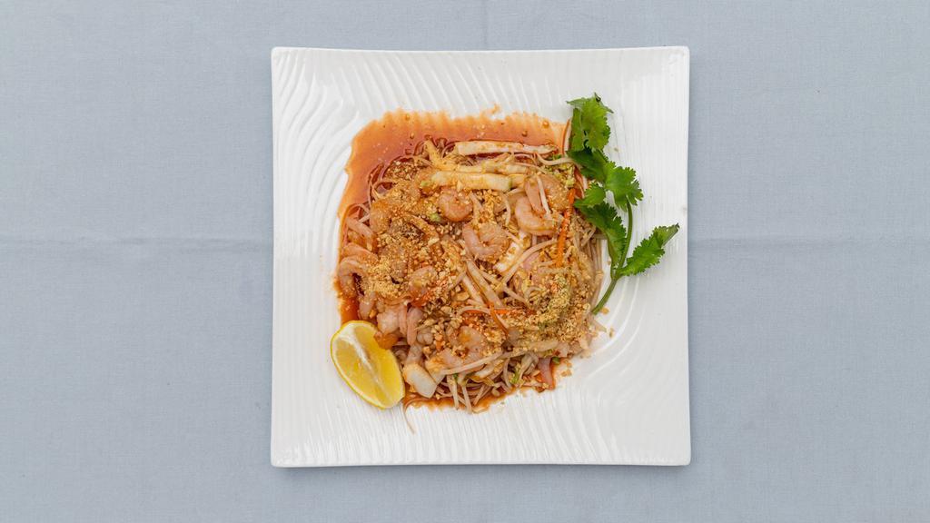 Pad Thai Shrimp · Thai style rice noodles topped with peanuts.