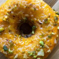 Ras Malai Donut · Rasmalai Donuts: Butter, Saffron, Banana, Cardamom, Fresh Cream, Sugar, Pistachios and Almon...