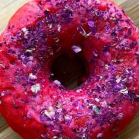 Rose Cardamom Donut · Donut on Rooh Afza base, topped with crushed Pistachios. No eggs.
