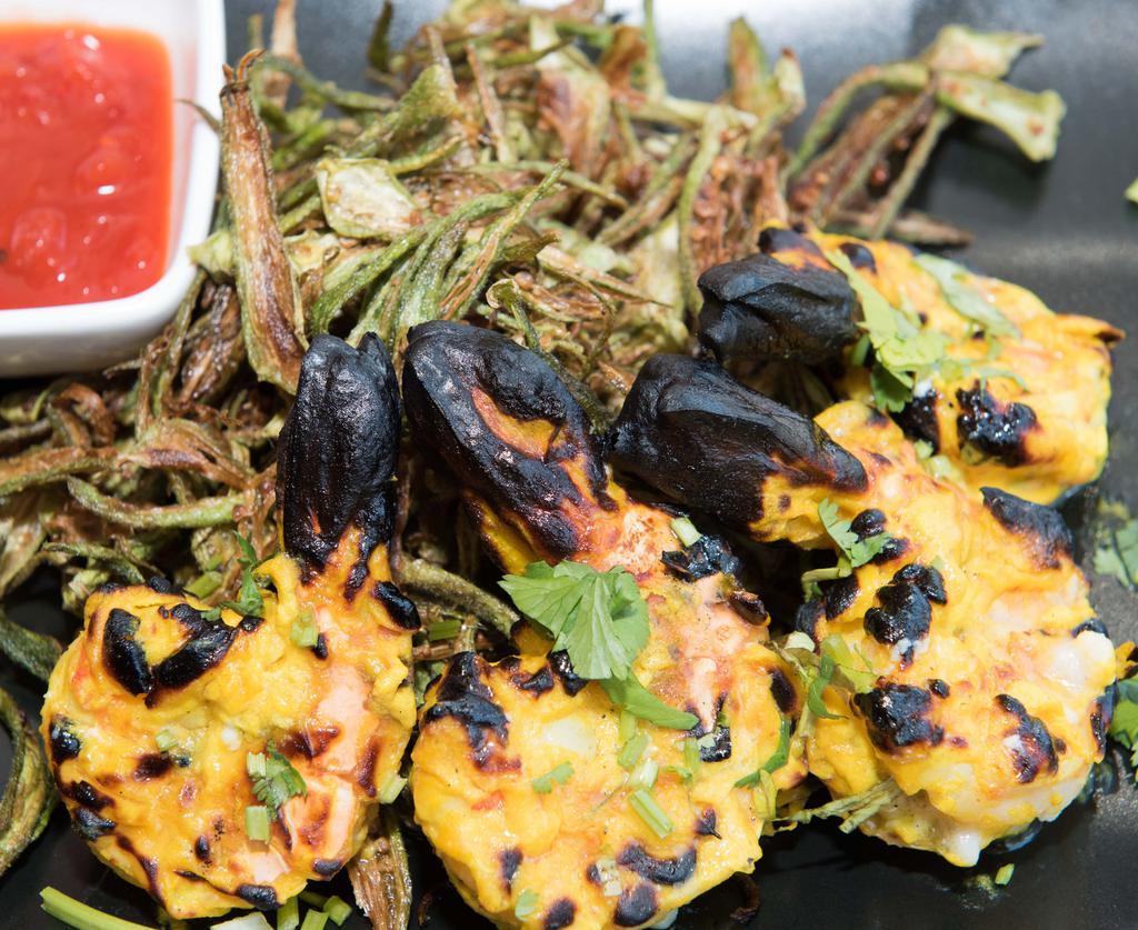 Tandoori Prawn · Jumbo shrimp marinated in fresh herbs and spices.