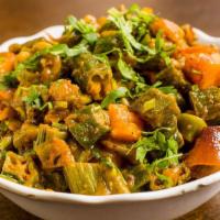 Bhindi Masala · Pieces of fresh okra simmered with diced onion, tomatoes, ginger and mildly spiced.