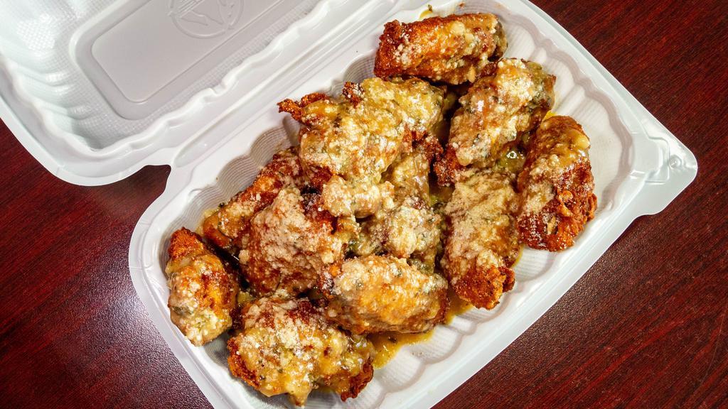 10 Wings  · 10 Fried Chicken wing pieces (drums & Flats) with your choice of Sauce Topping