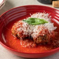 Meatballs · Three meatballs made with pork, beef, and veal make them tender and always pink in the cente...