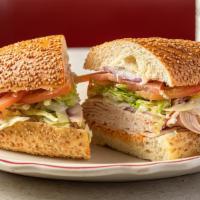 House Turkey Hero · House-roasted turkey cut into thick slices, on a sesame hero with lettuce, tomato, red onion...