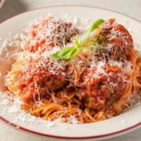 Spaghetti Meatballs · Three of our meatballs served over spaghetti topped with tomato sauce, parmesan, and basil