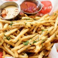Italian Fries · Crispy French fries with garlic oil, Italian herbs, and parmesan cheese