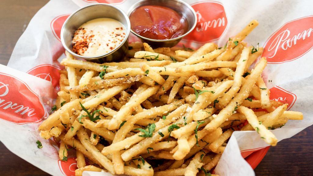 Italian Fries · Crispy French fries with garlic oil, Italian herbs, and parmesan cheese