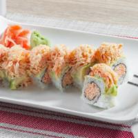 Christmas Roll · Toasted spicy shrimp and crabmeat topped with avocado and more spicy shrimp and crabmeat.