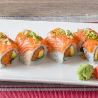 Alaska Beauty Roll · Spicy crunchy salmon and avocado wrapped with fresh salmon.