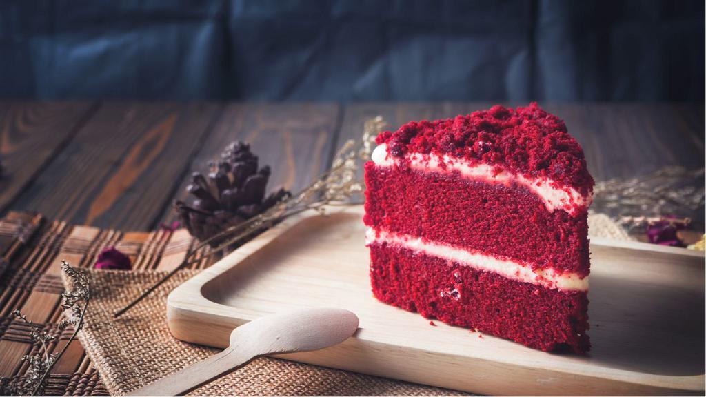 Red Velvet Cake Slice · Classic red velvet flavored cake!