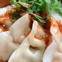 Red Dumplings (5Pcs) · Boiled dumplings with chef’s special sauce made with fried garlic spicy chili oil and soy sa...