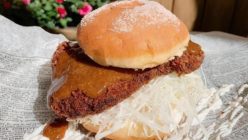 Fried Chicken Katsu Burger · Served with shredded cabbage and special Katsu sauce.