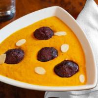 Beetroot Malai Kofta · House specialty. Beetroot dumplings with onions in an aromatic sauce.