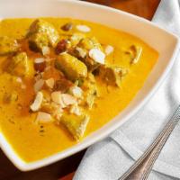 Lamb/Goat Korma · Choice of lamb or goat cooked in a mild creamy sauce.