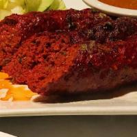 Seekh Kebab · Tandoor grilled lamb sausage, cased in sweet pepper.