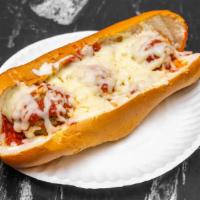 Meatball Parmigiana · Served with spaghetti or ziti and bread.