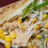 Spicy Sensation · Creamy cayenne pepper chicken, bell peppers, corn and mozzarella cheese
