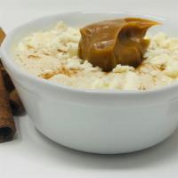 Arroz Con Leche · Our traditional rice pudding with caramel spread / Arroz con leche con arequipe