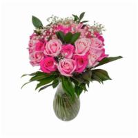 Pink Heart Love · Consist of 12 pink roses in a clear vase.