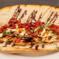 Grilled Chicken Italiano · Fresh mozzarella, roasted peppers, balsamic vinegar and fresh basil.