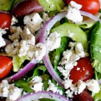Greek Salad · Mixed greens, feta, kalamata olives, cucumbers, fresh green peppers and tomatoes.