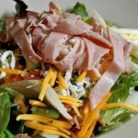 Chef Papa Salad · Rolled up turkey, ham and provolone over our house salad.